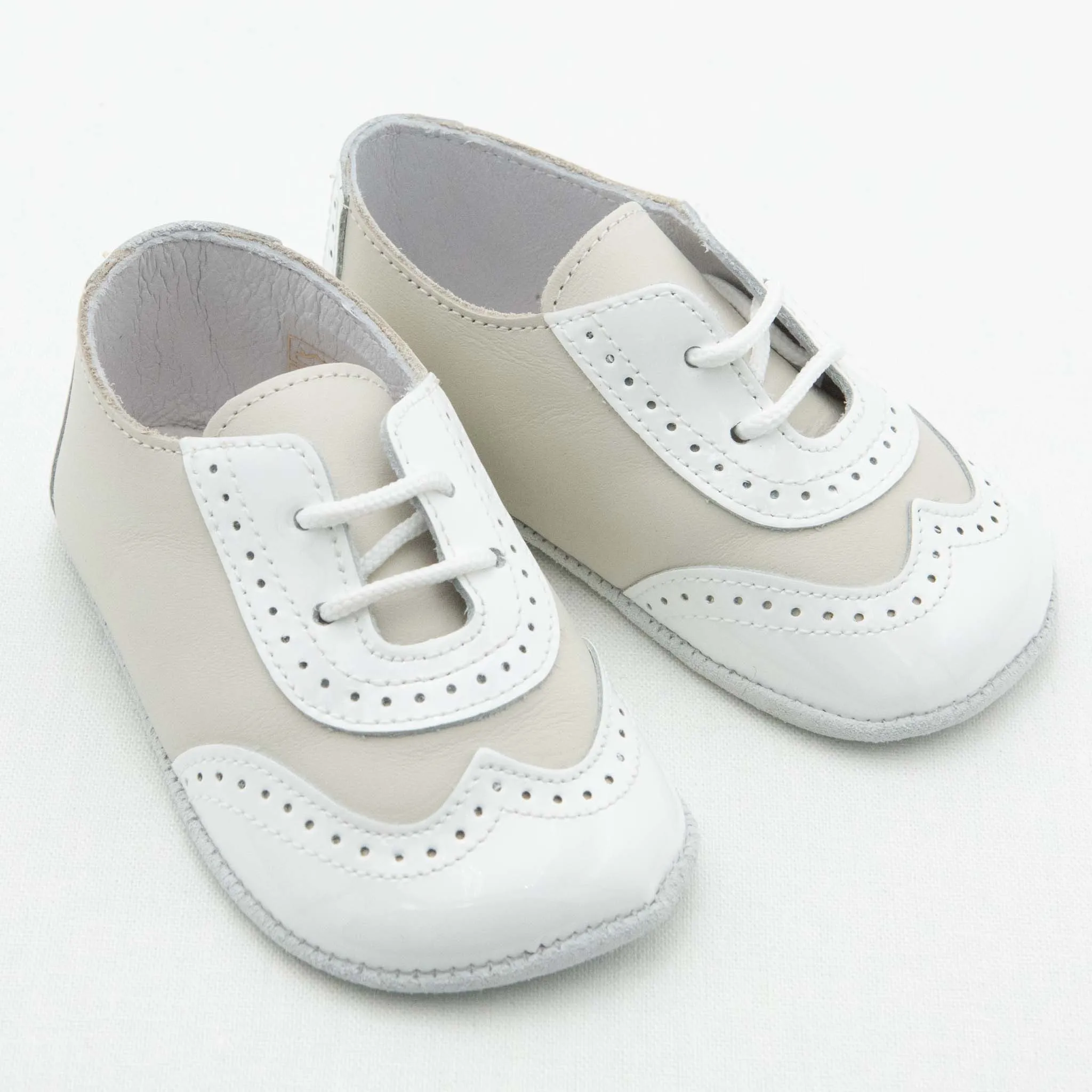 Ivory Two Tone Wingtip Shoes